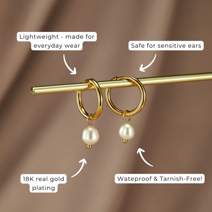 Pearl hoop earrings worn in the ear to show the fit