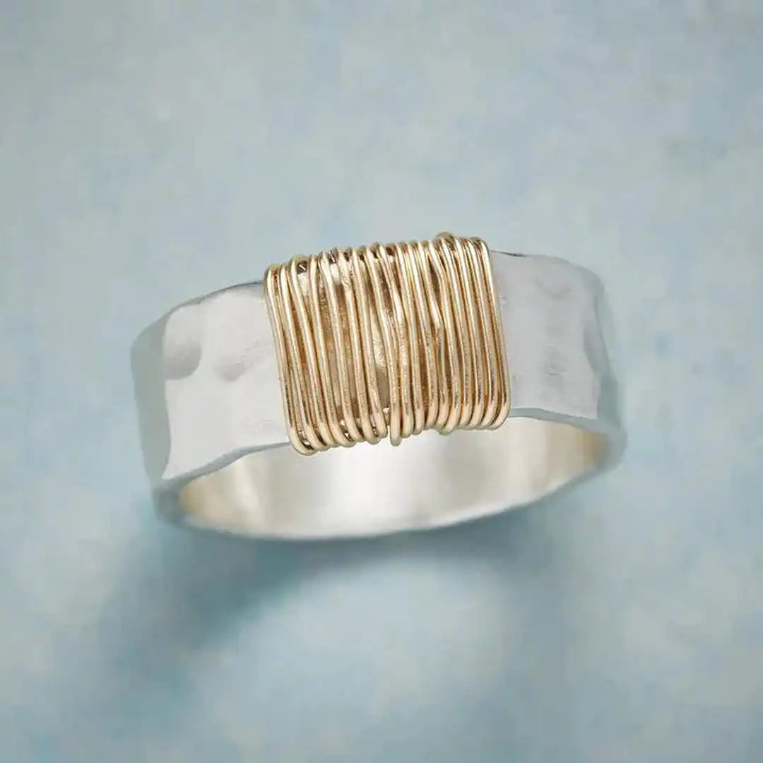 Main shot of the golden thread silver ring