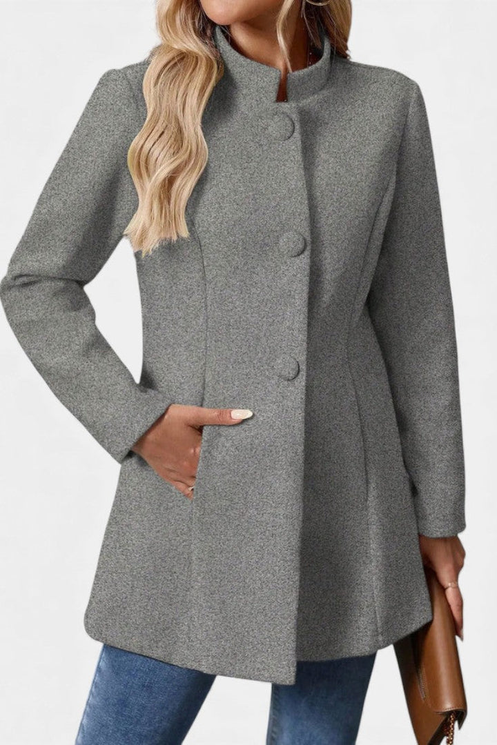 Lyana high collar coat full length walking view