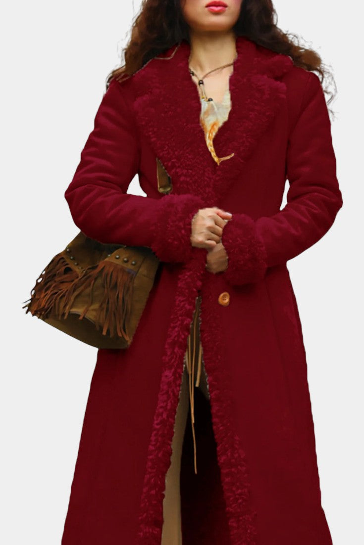 Massilia coat button closure and hem detail