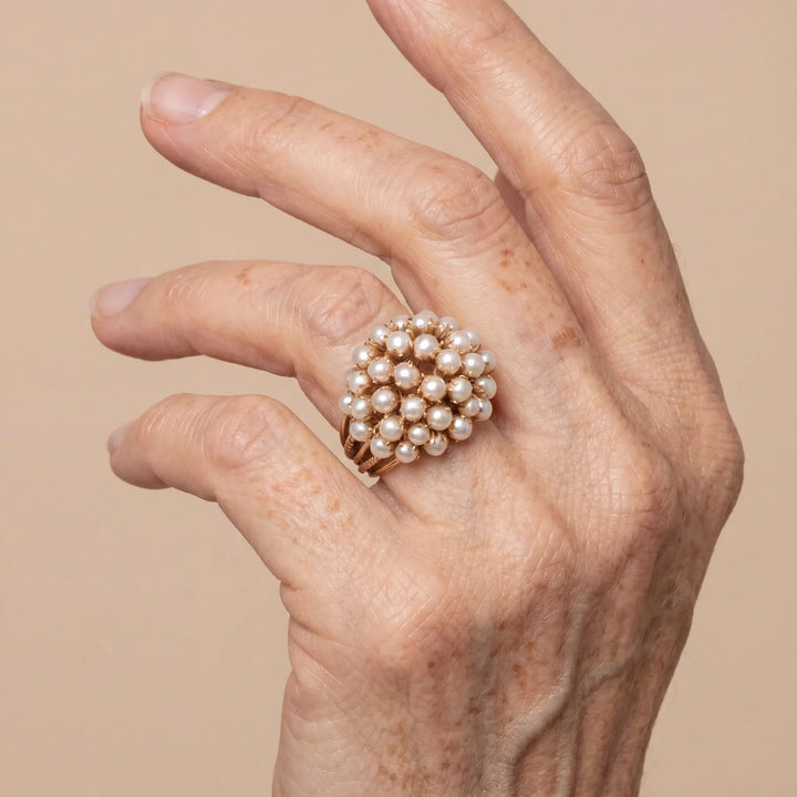 Close-up of the inlaid pearl setting on the ring band
