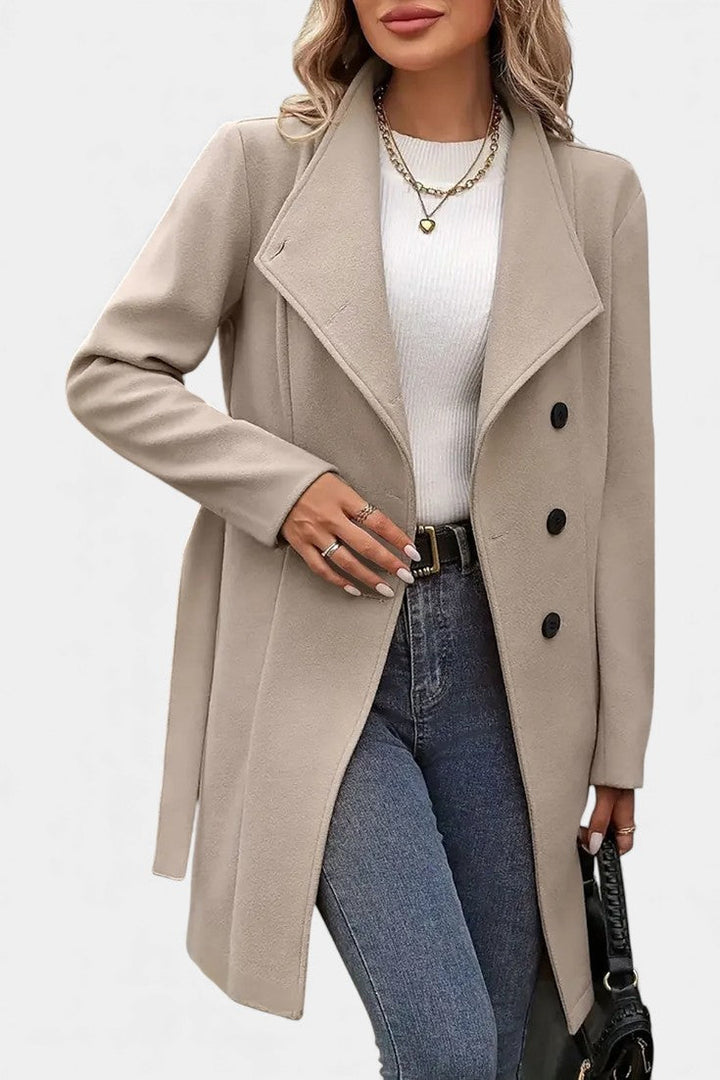 Yuliana coat button and belt tie detail close-up