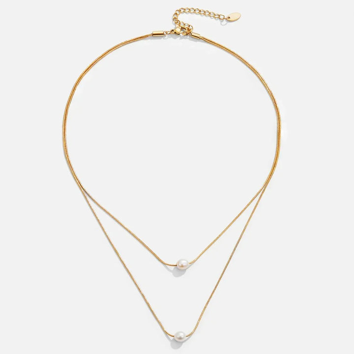 Model wearing the sophisticated layered pearl necklace