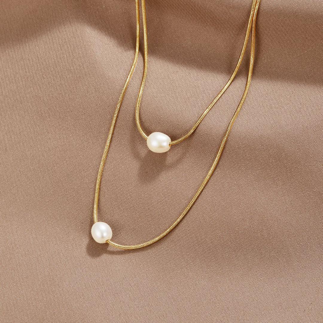 Sophisticated layered pearl necklace shown as the main product photo