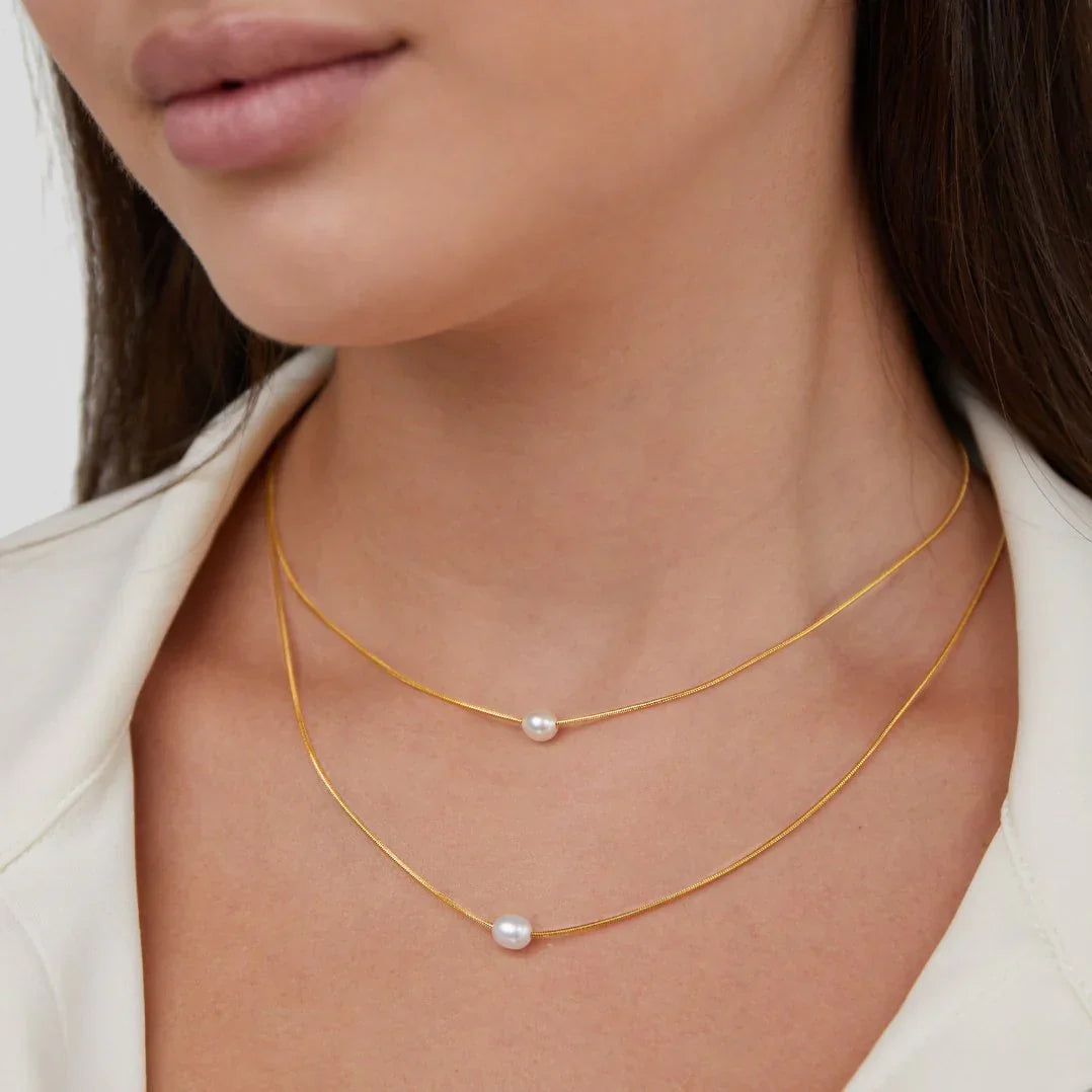 Close-up of the freshwater pearl strands on the necklace