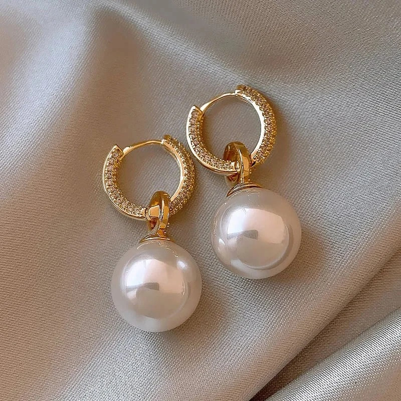 Dazzling pearl earrings displayed from an alternate angle