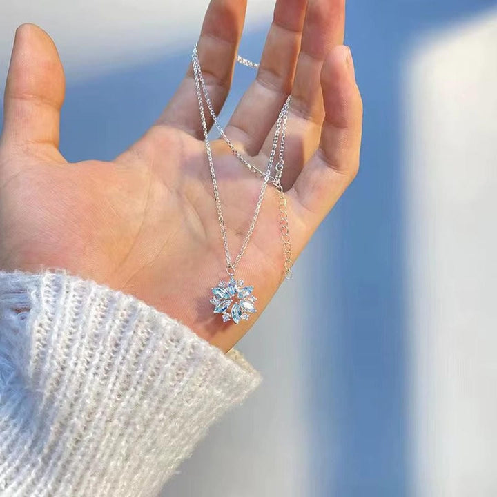 Necklace worn on a model's neckline