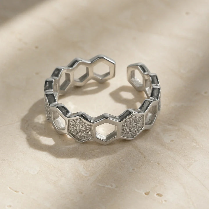 Ring worn on a model's hand