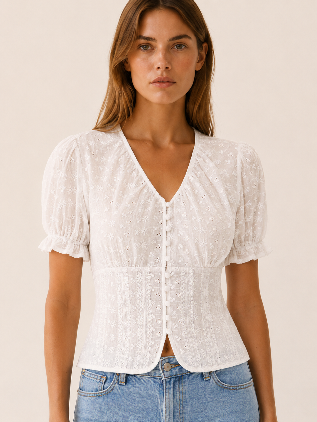 White Eyelet Blouse with Puff Sleeves and Tie Back – detail view