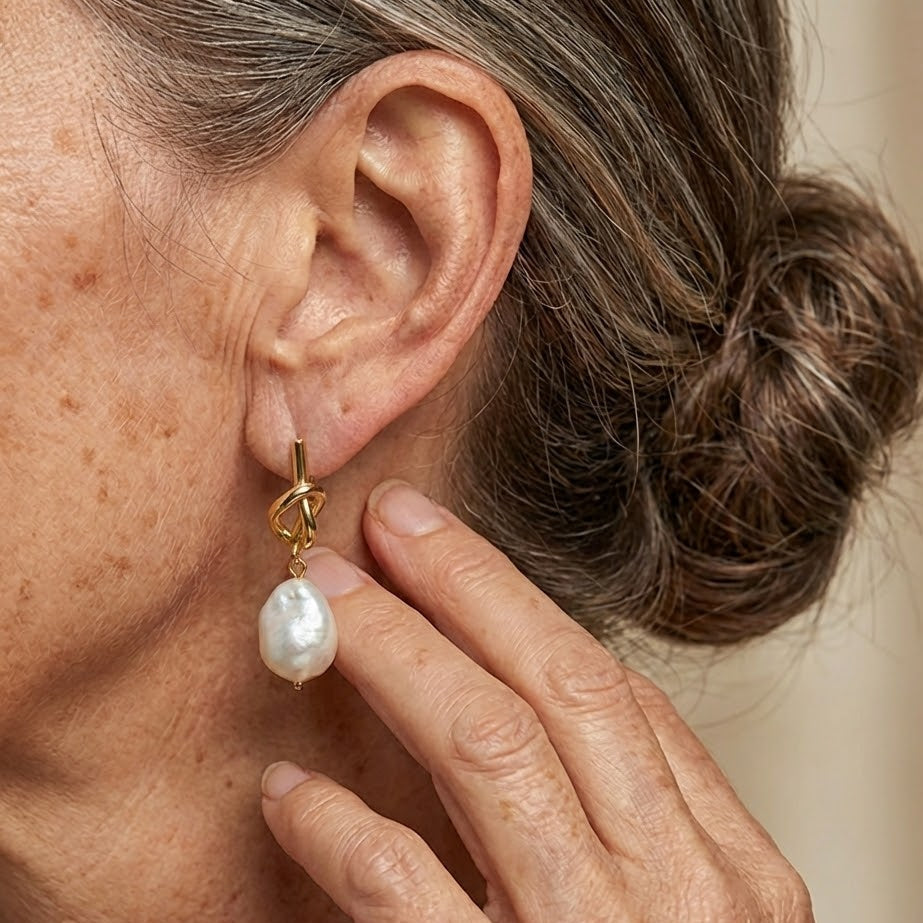 Close-up of the hand-knotted cord and pearl bead