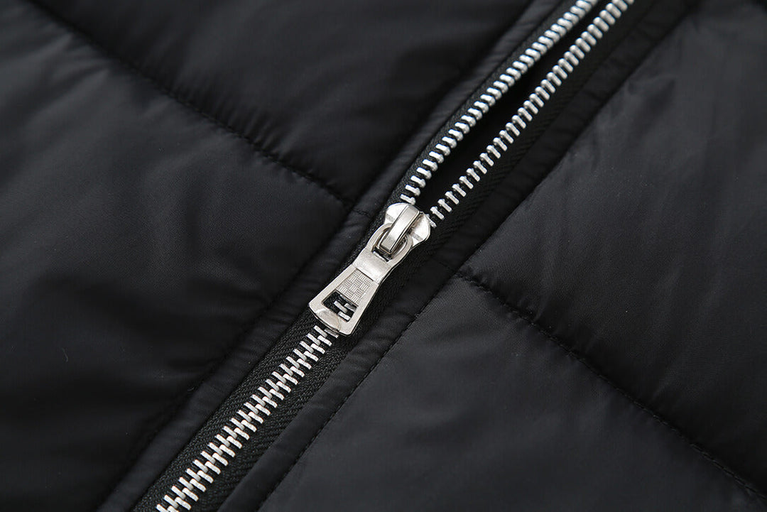 Close-up of the plaid puffer jacket's zipper detail